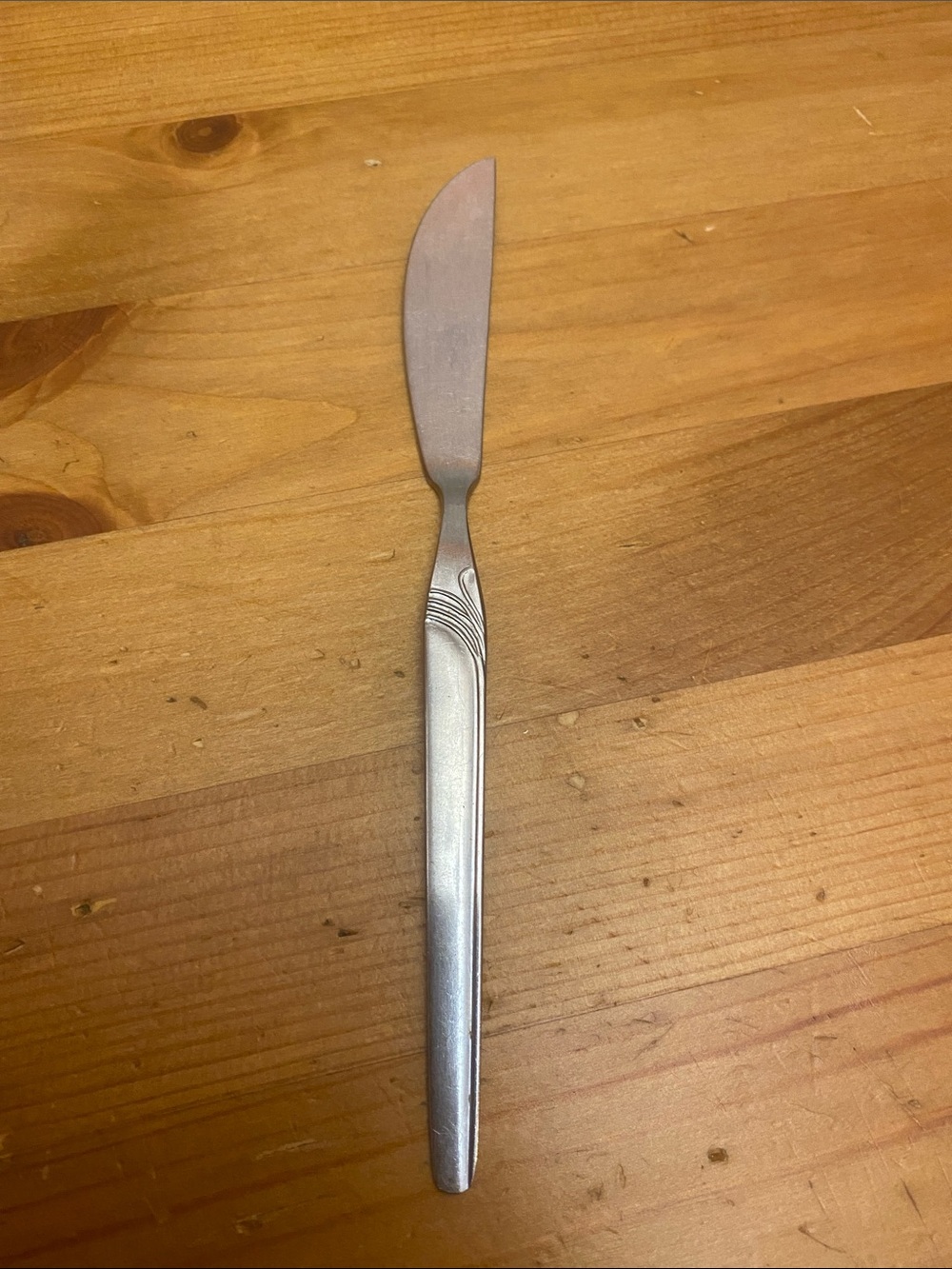 Stainless Steel Butter Knife with Subtle Wave Detail - Silver